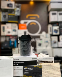 SIGMA 18–50mm f/2.8 DC DN – LENTE SEMINOVA COM CAIXA COMPLETA